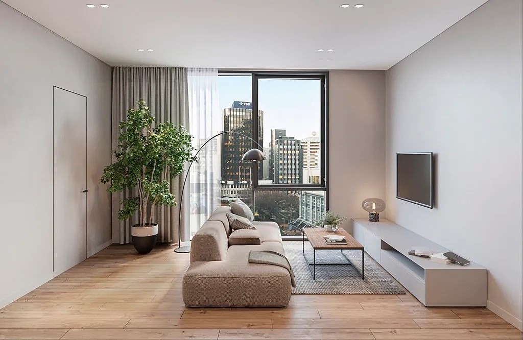 a living room with furniture and a flat screen tv