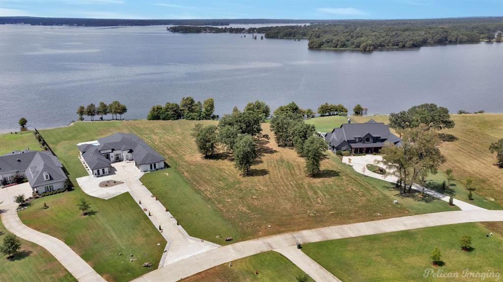 an aerial view of a house having yard