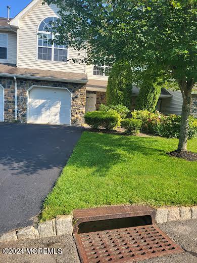 a view of backyard with a patio