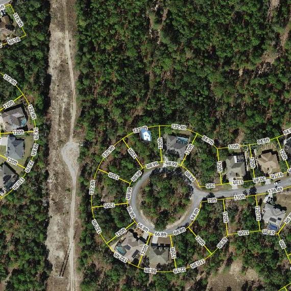 an aerial view of residential house with outdoor space