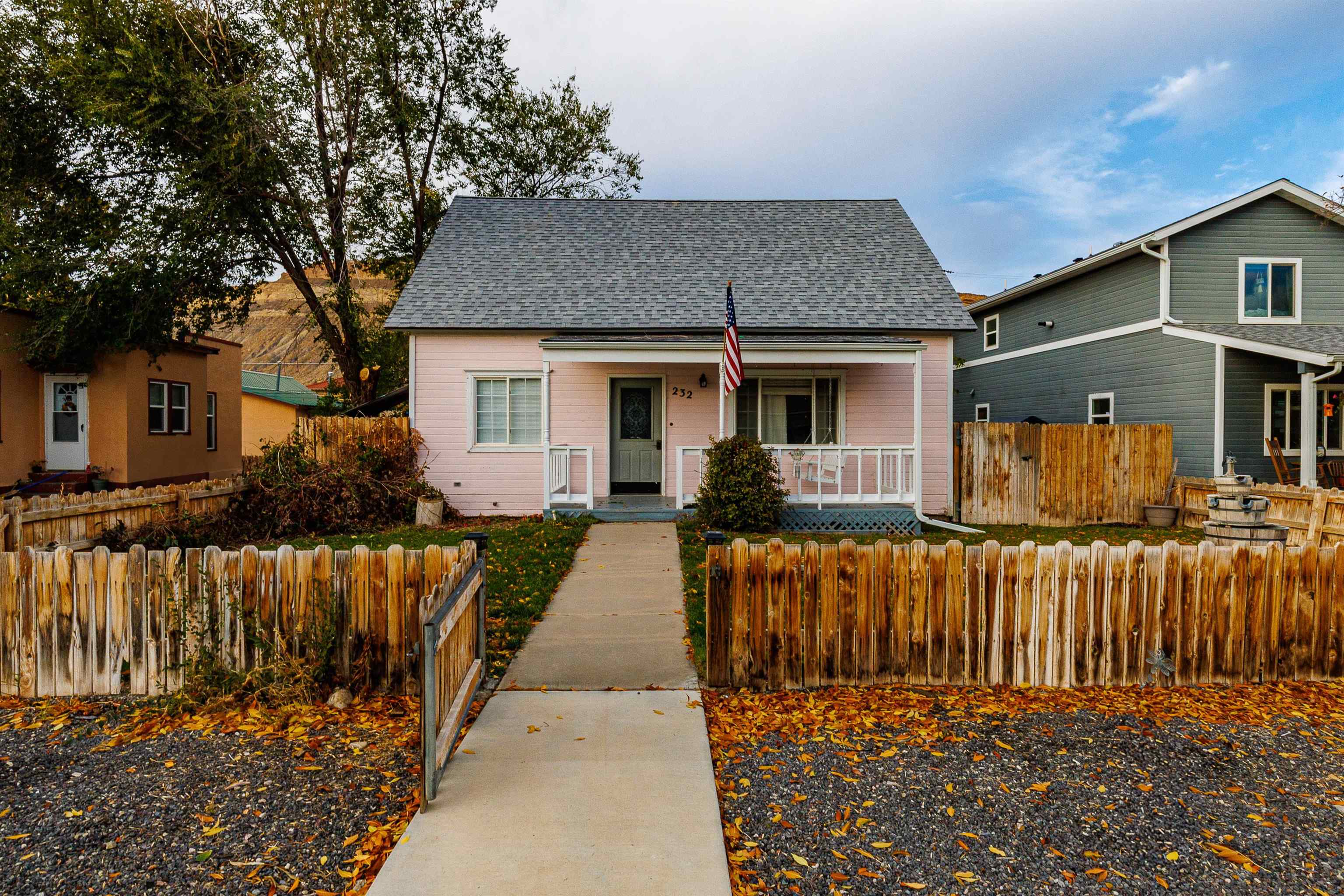 front view of a house with a yard