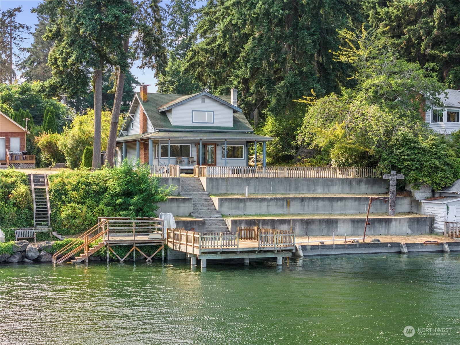 a front view of a house with a boat