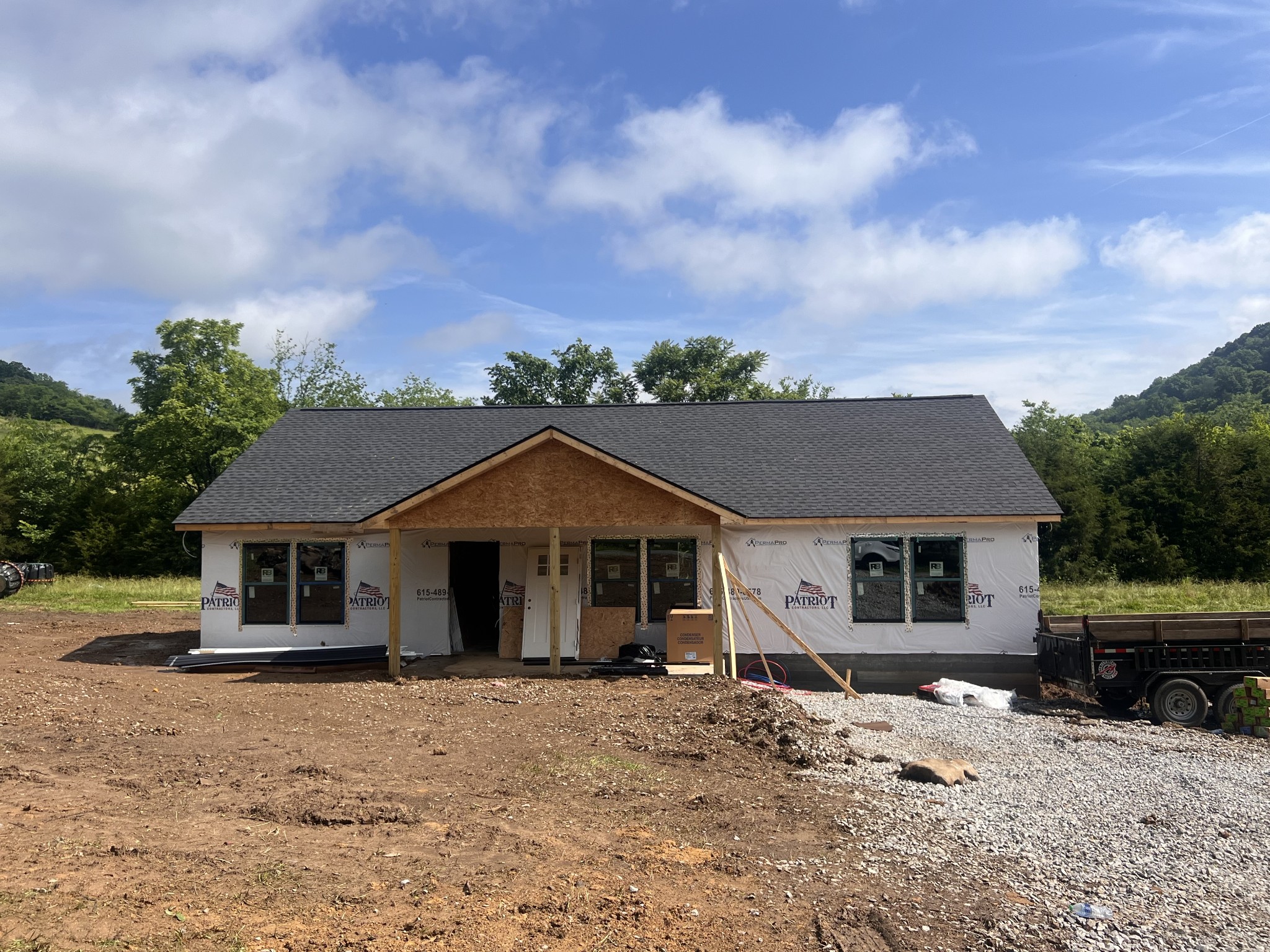 front view of a house with a yard