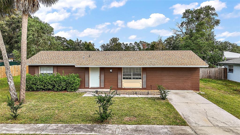 front view of a house with a yard