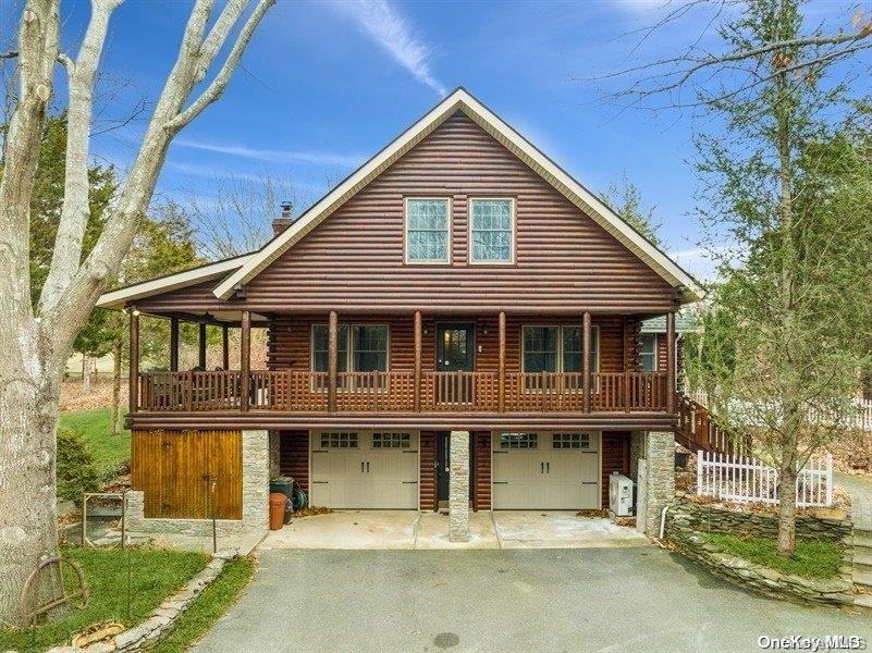 a front view of a house with a porch