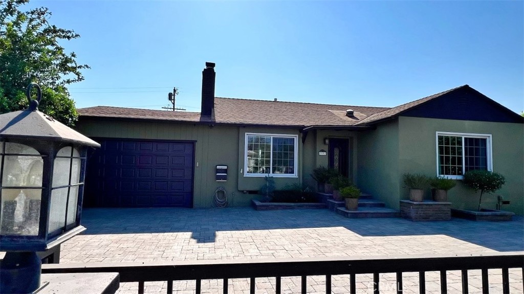 a view of house with outdoor space