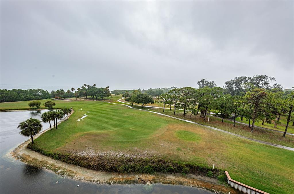 a view of a lake with a big yard