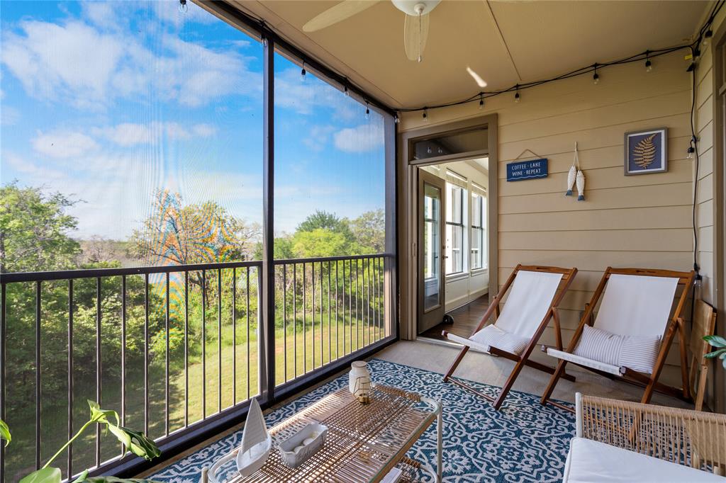 a view of balcony with furniture