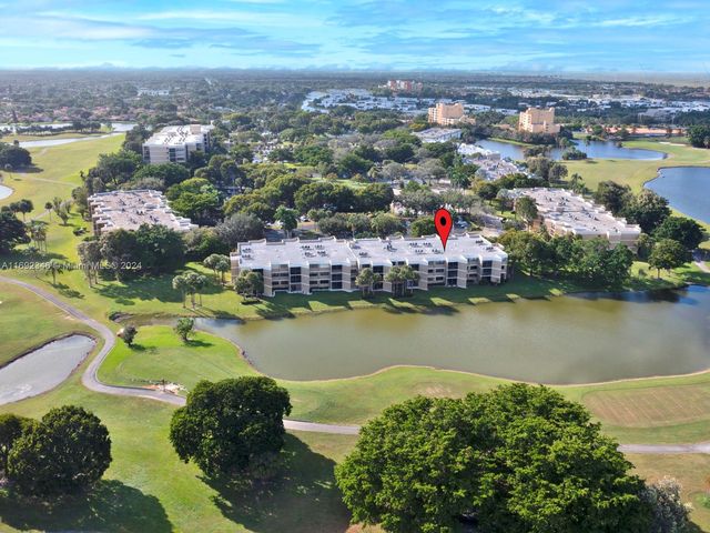 $395,000 | 16100 Golf Club Road, Unit 203 | Bonaventure