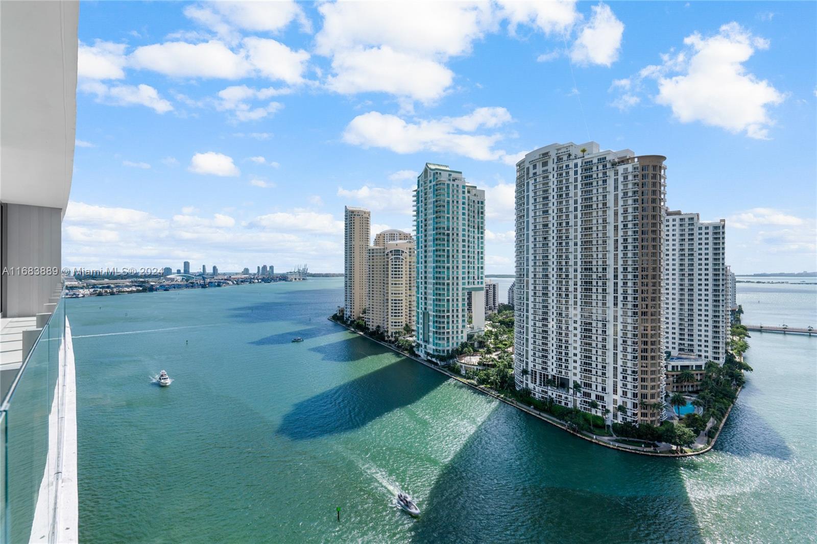 a view of a city with tall buildings