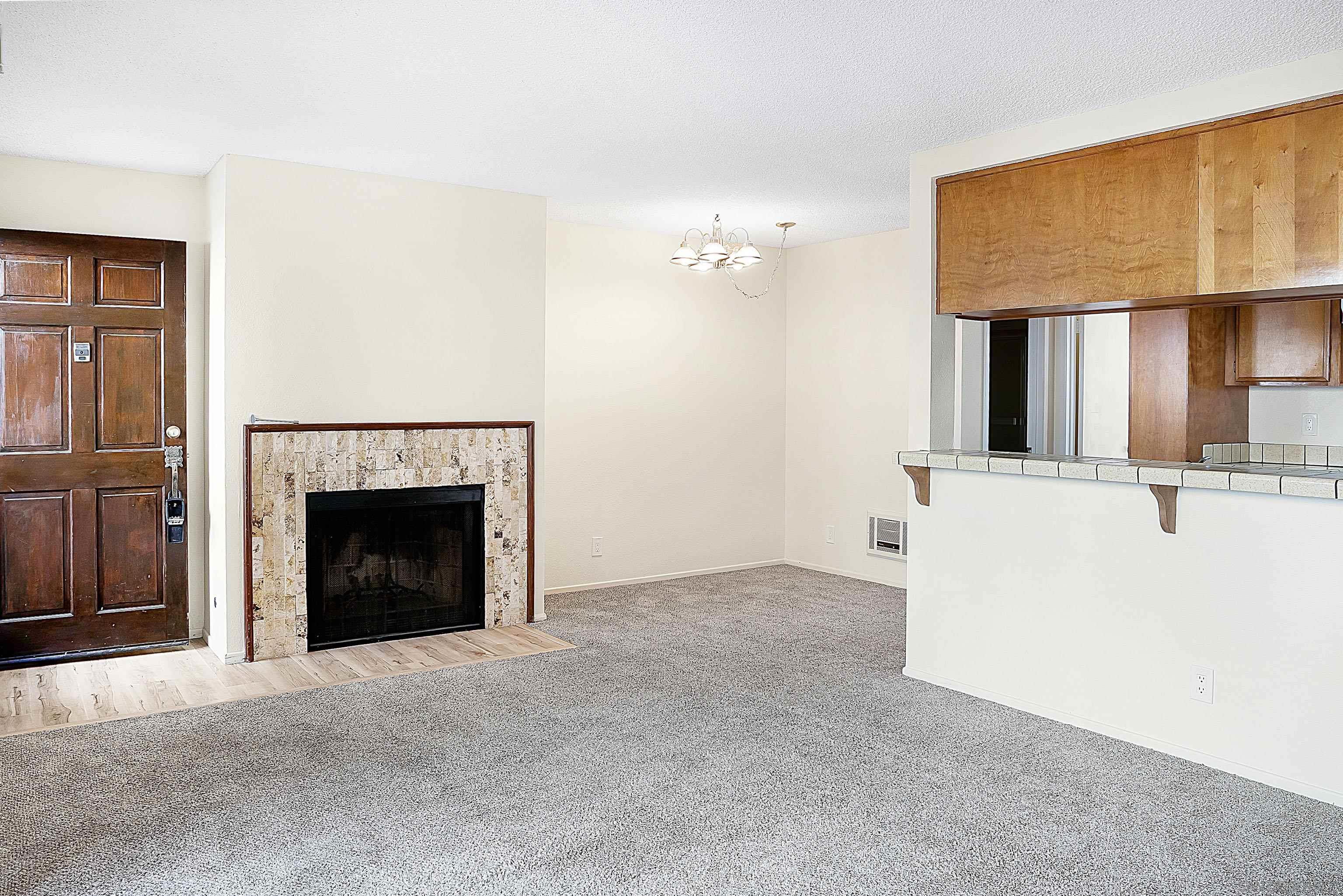 a view of a livingroom with a fireplace