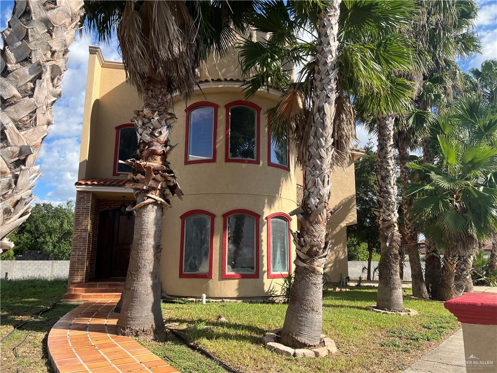 front view of house with a yard