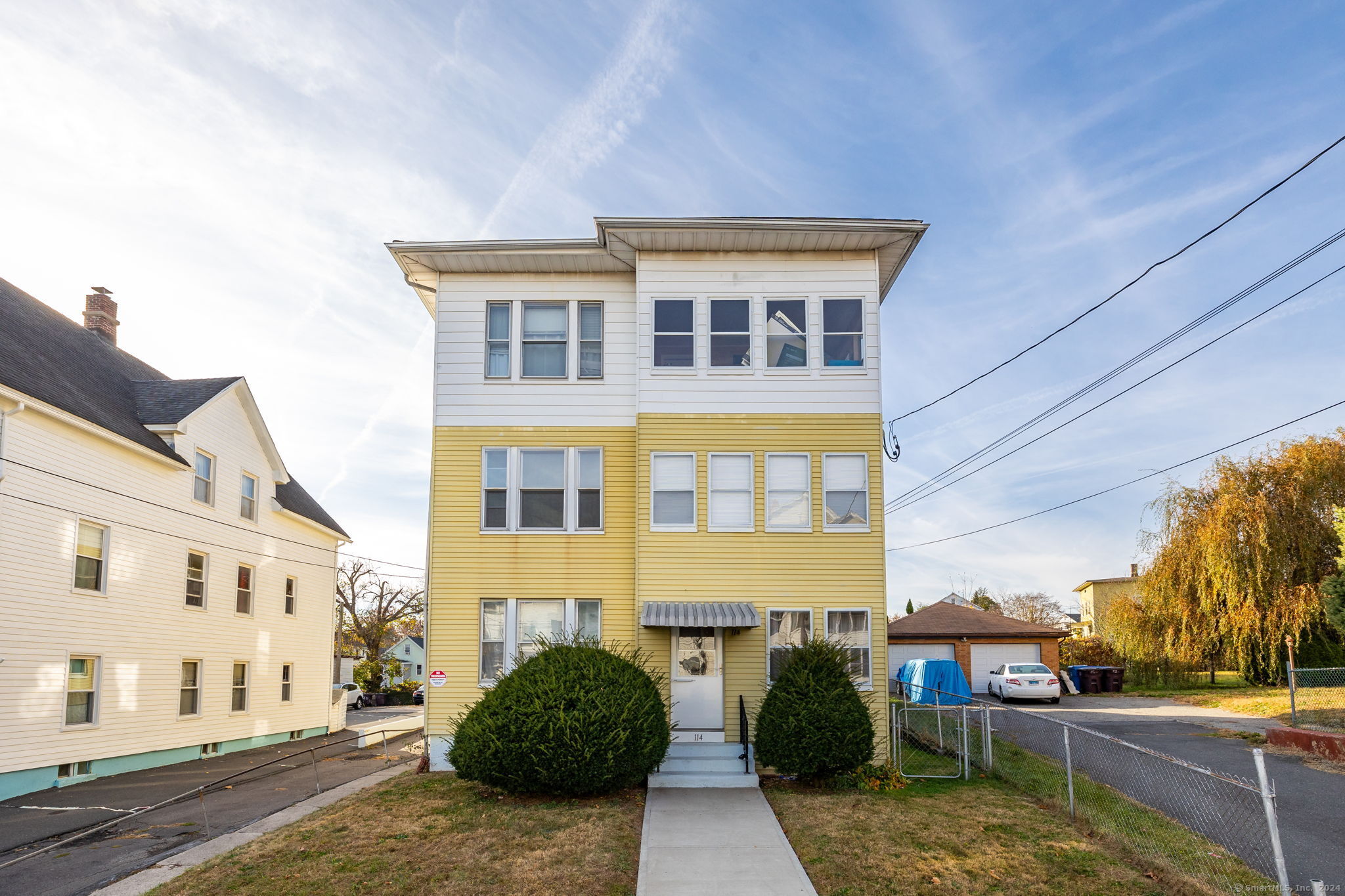 a front view of a building with street