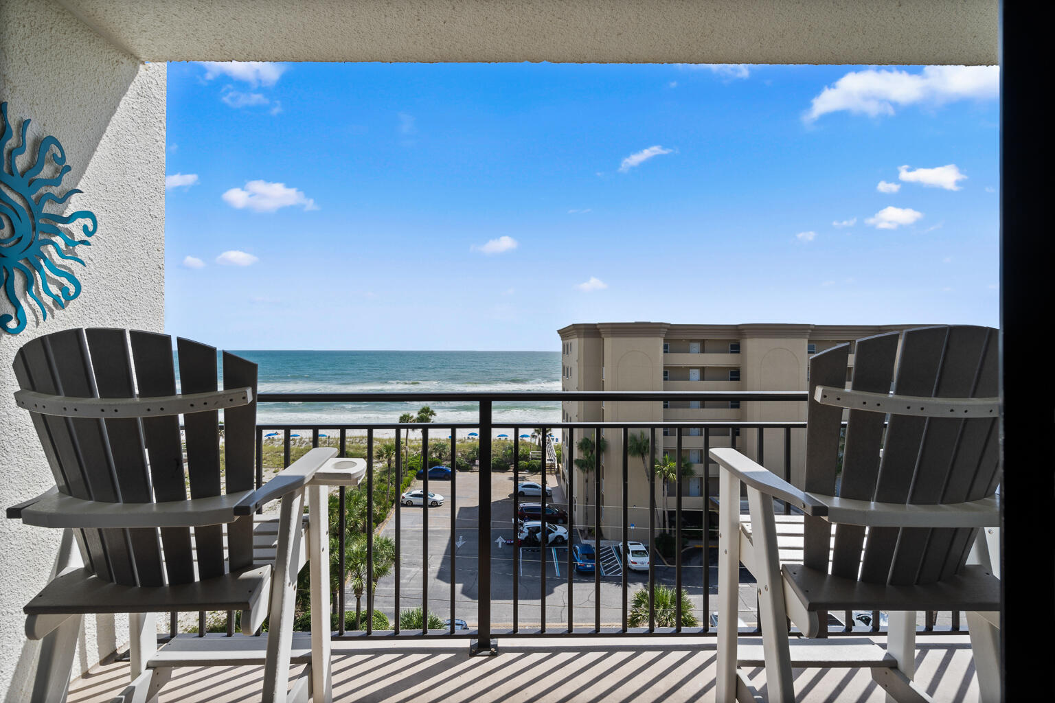 a view of balcony with furniture