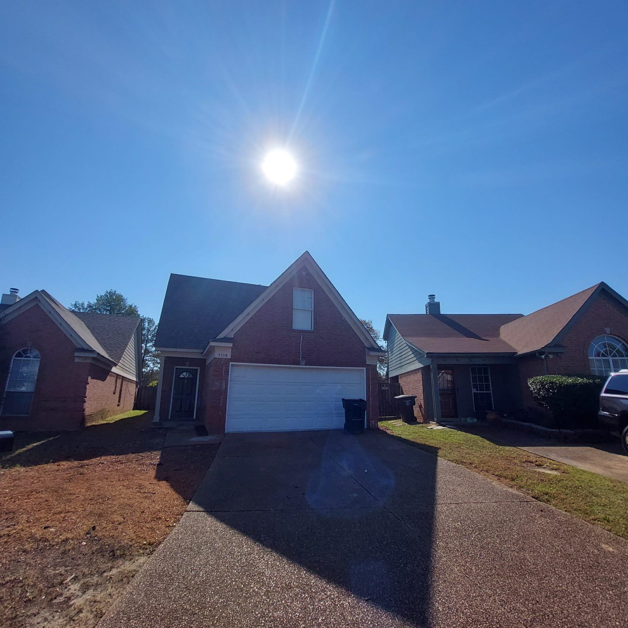 View of front of home featuring a garage