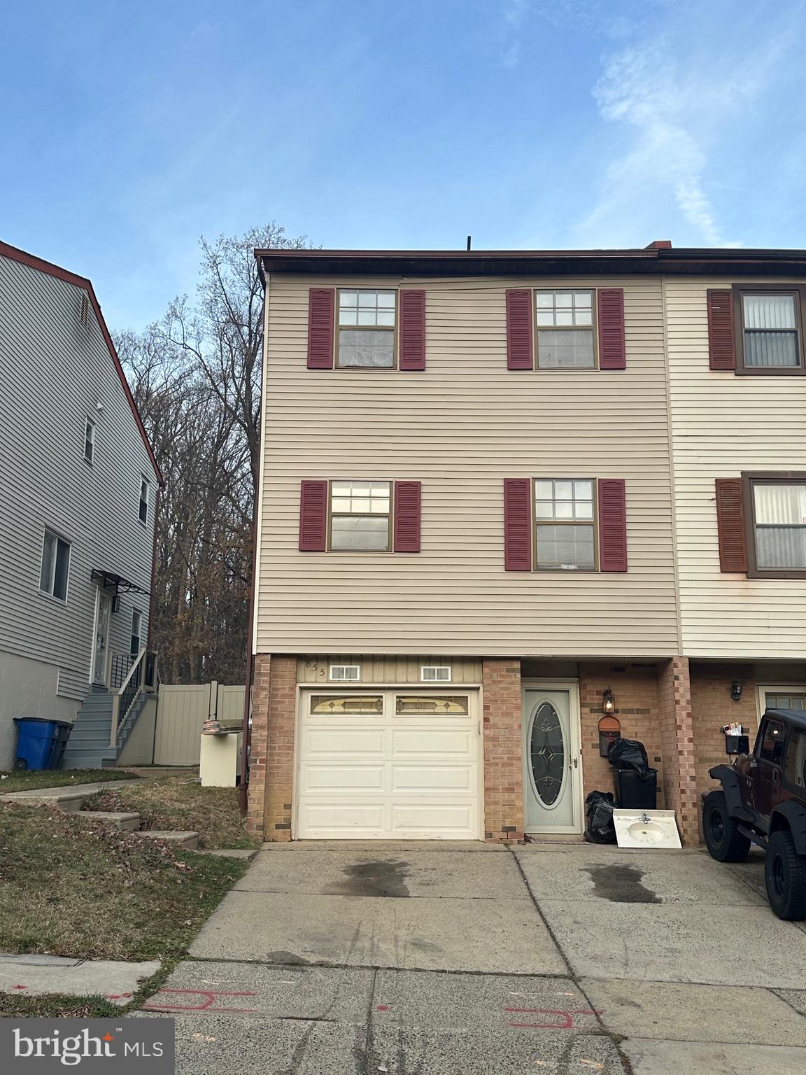 a front view of a house with yard