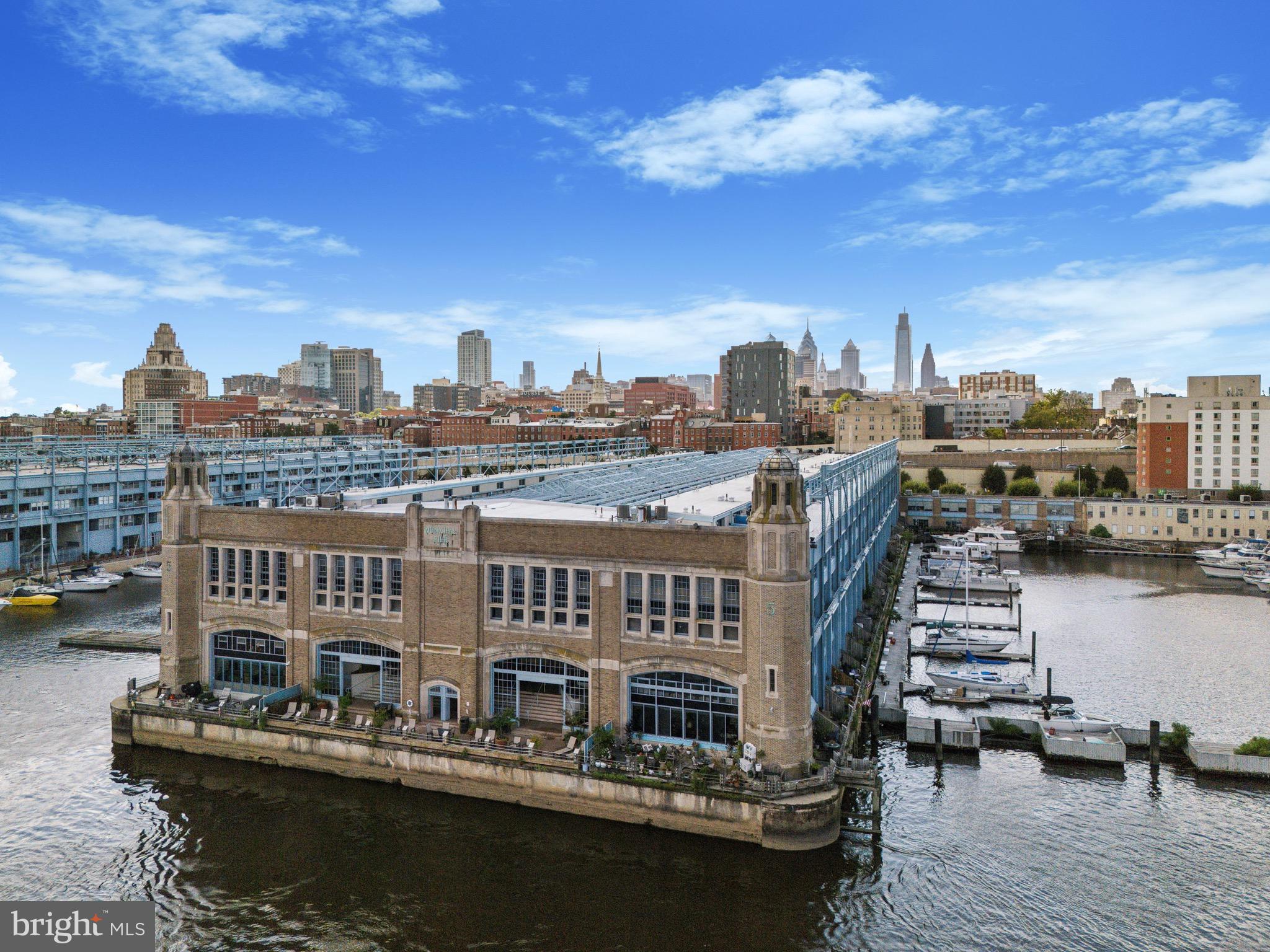 a view of a lake with tall buildings