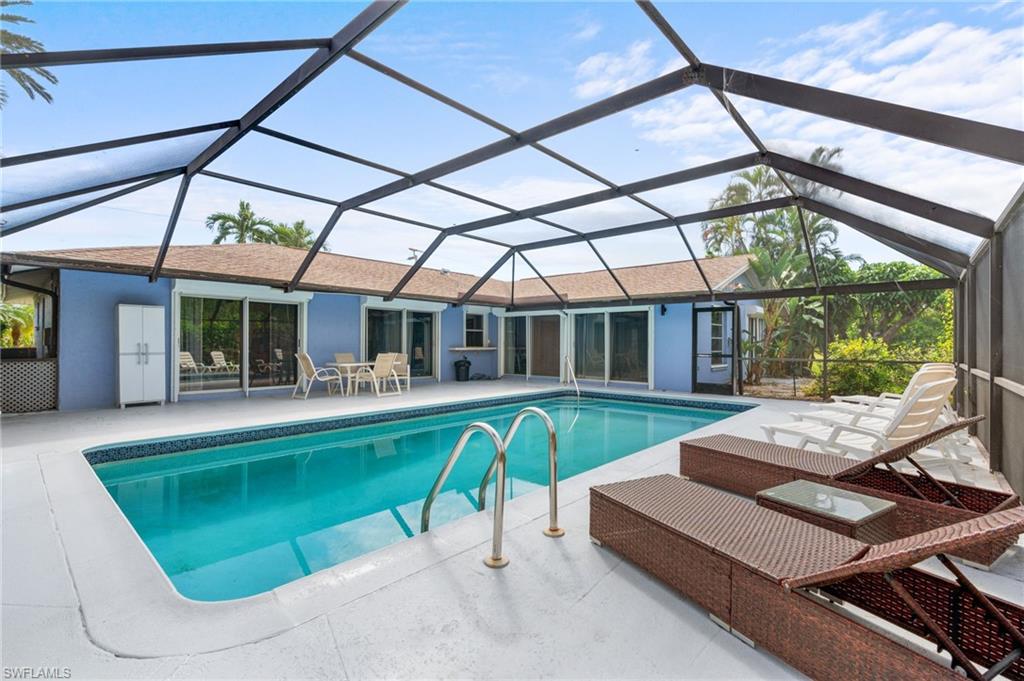 a view of a house with a swimming pool