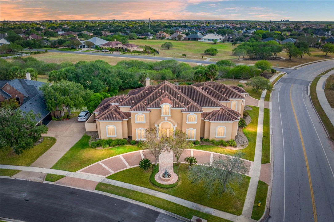 a view of a house with big yard