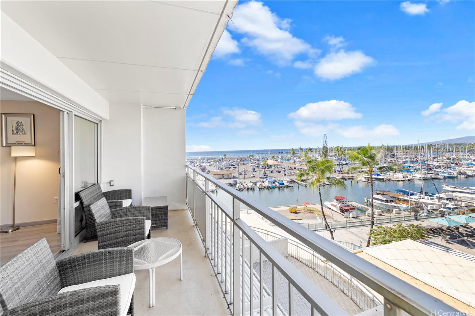 a view of a balcony with furniture