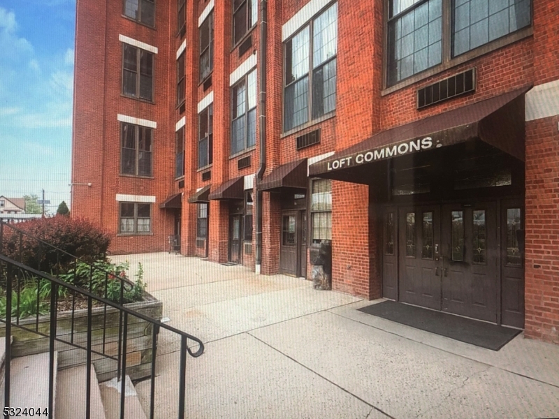 a view of a building with a glass door