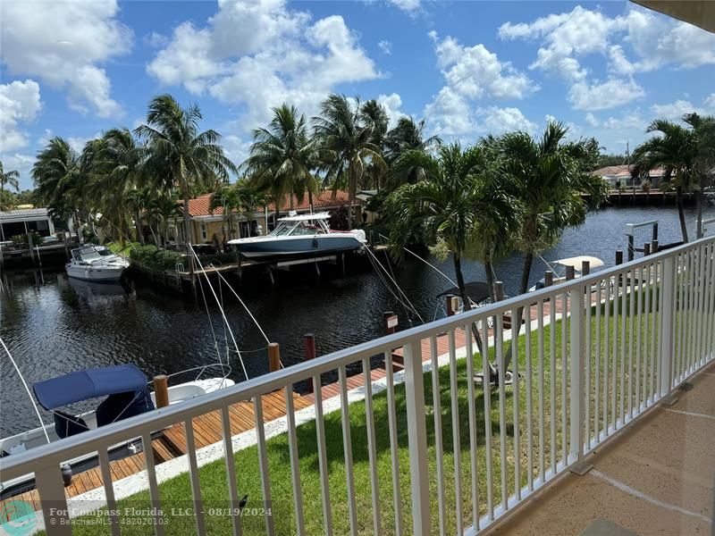 a view of a balcony with lake view