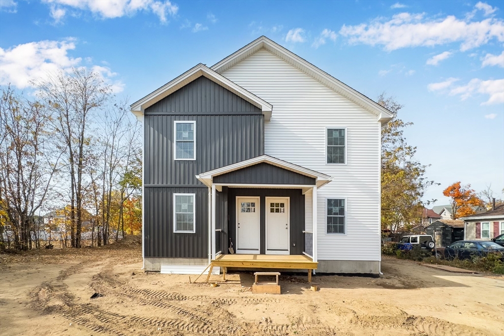 a front view of a house with a porch