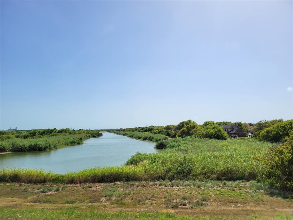 a view of a lake from a yard