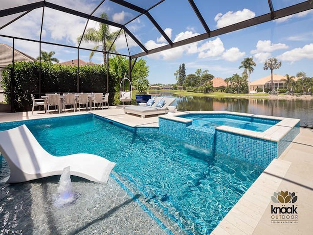 a view of a swimming pool with a patio