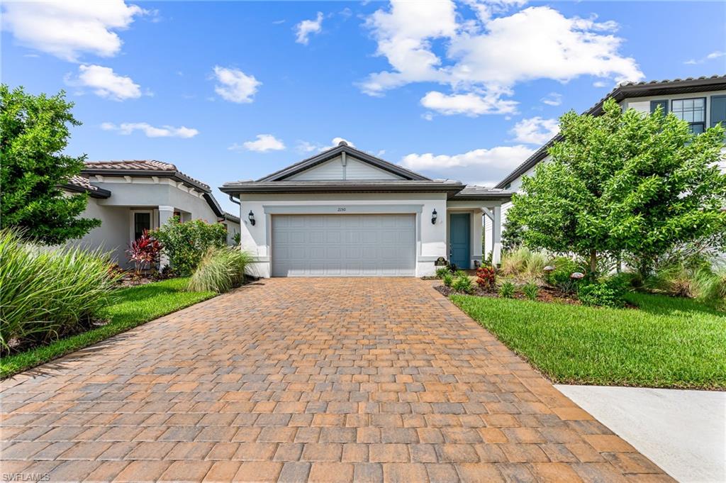 View of front of home featuring a garage