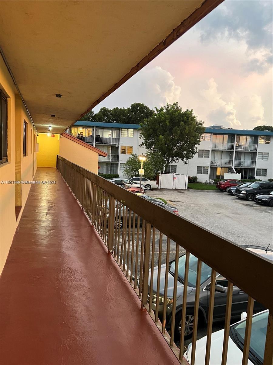 a view of a building from a balcony