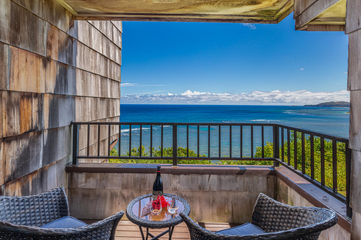 a view of balcony with furniture