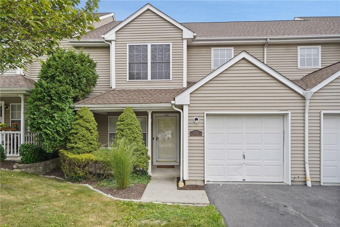 View of front of property featuring attached garage