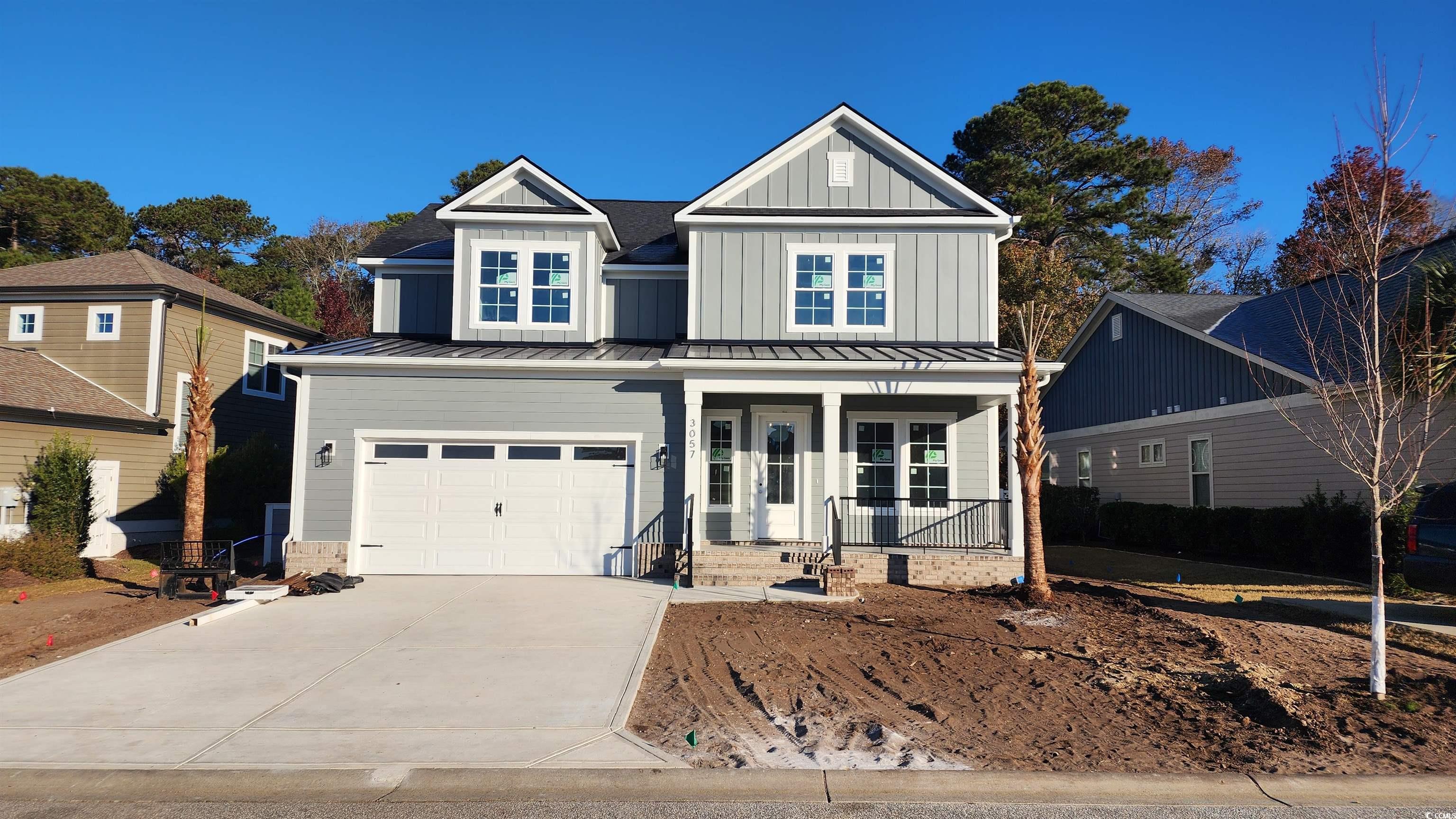 View of front of property featuring covered porch