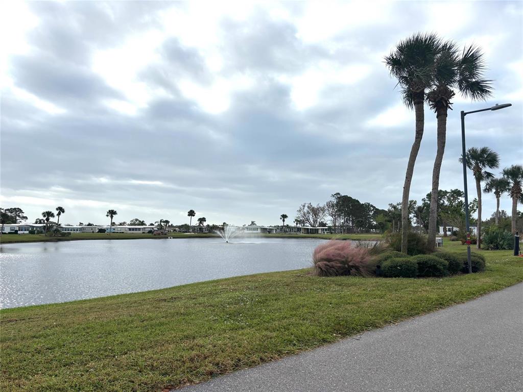 a view of a lake with a big yard