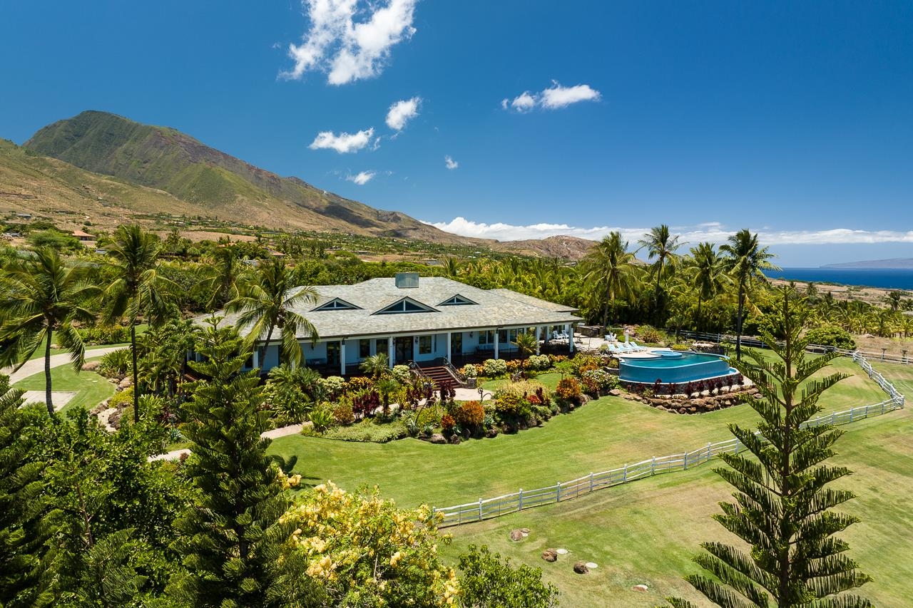 a view of a swimming pool with a garden