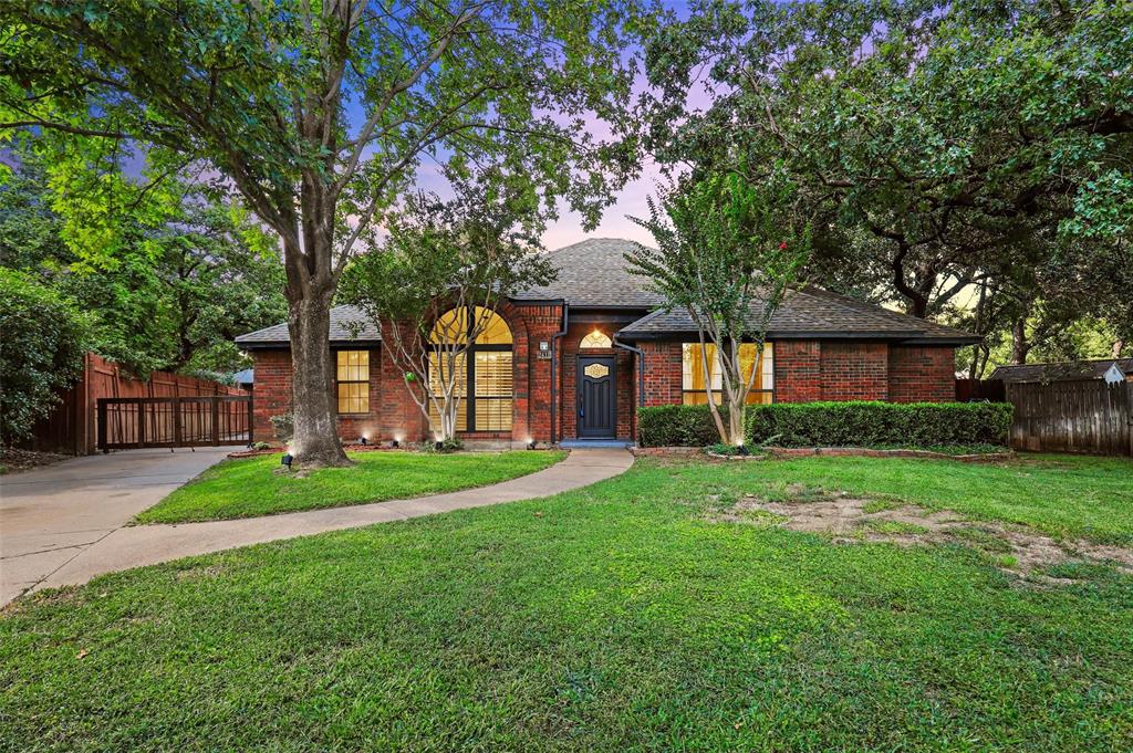 a view of a big yard next to a house