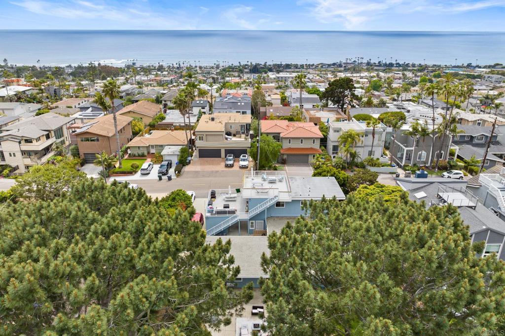 an aerial view of residential building with parking space