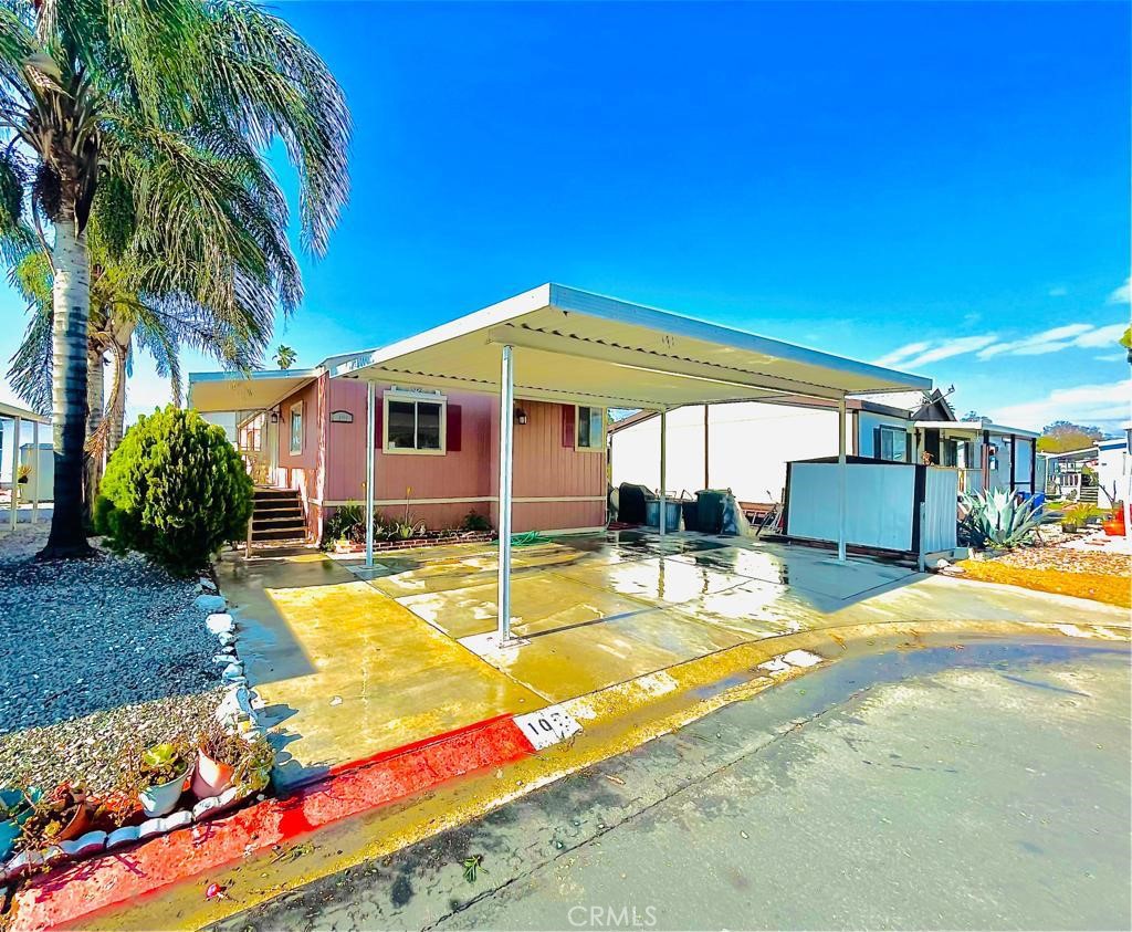 a view of a house with swimming pool