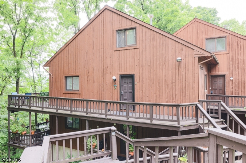 a view of a house with roof deck