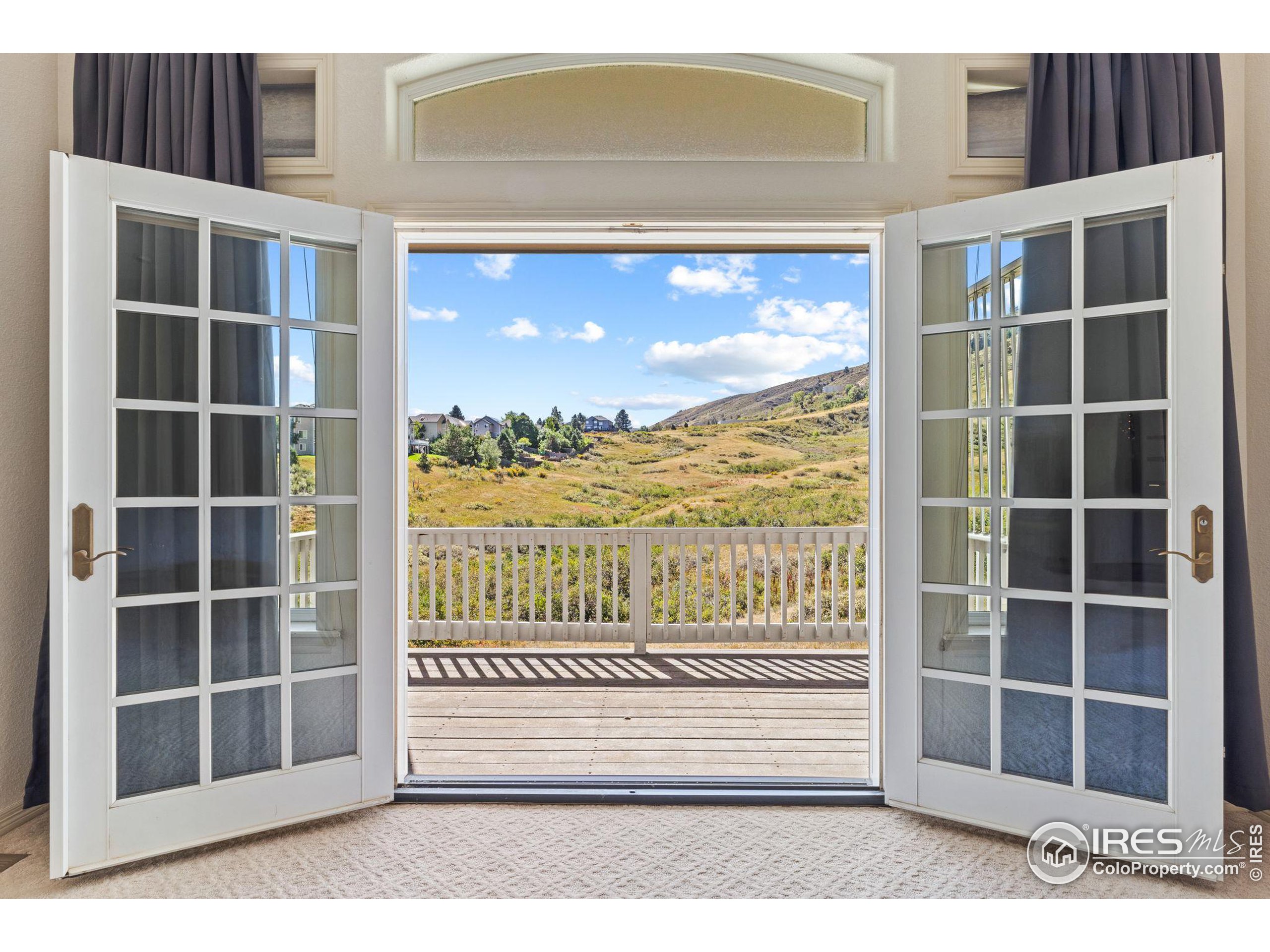 a view of a balcony with a door