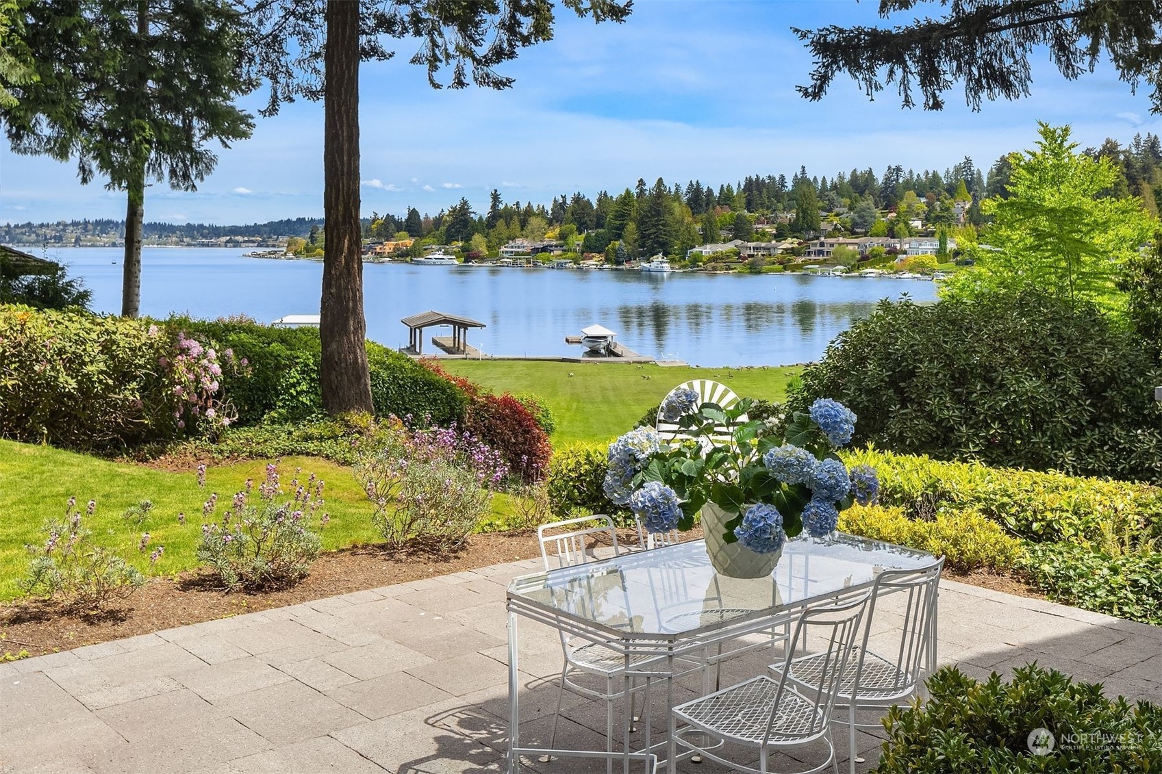 a view of a lake with a garden