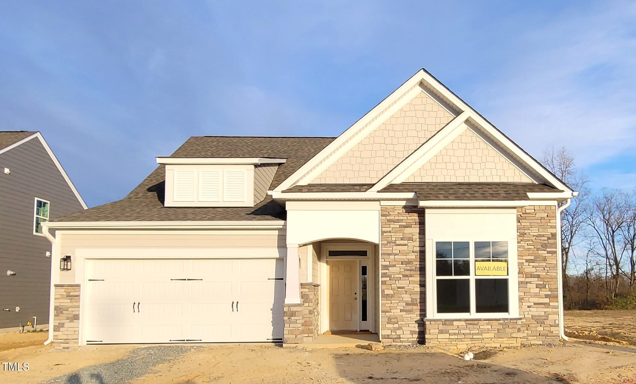 a view of a house with a garage