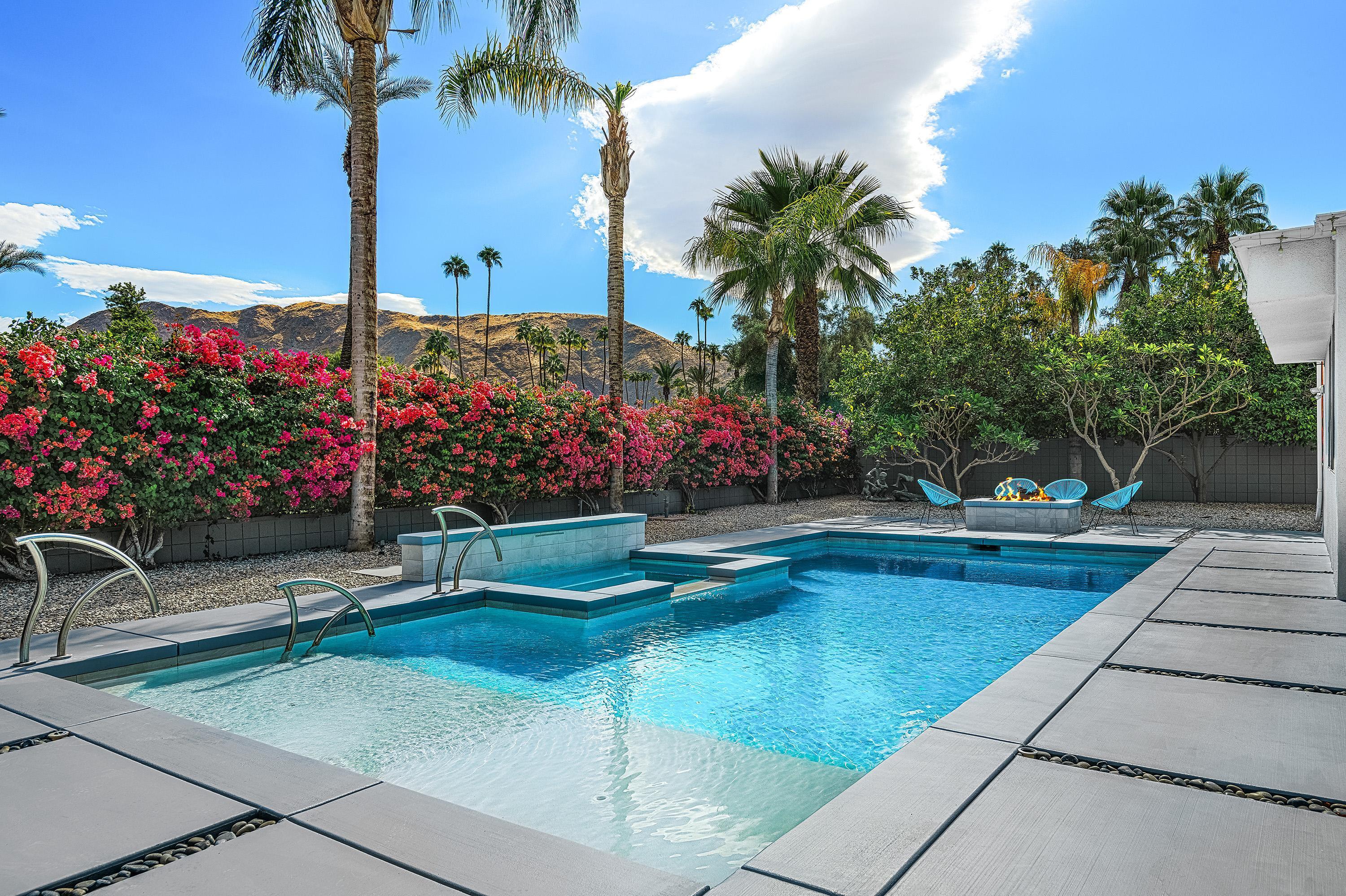 a view of swimming pool with a patio