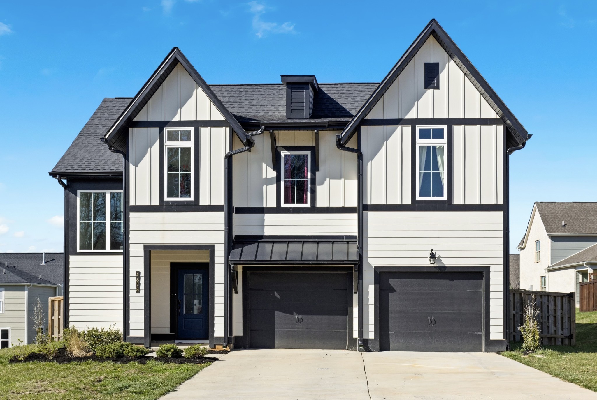 a front view of a house with yard