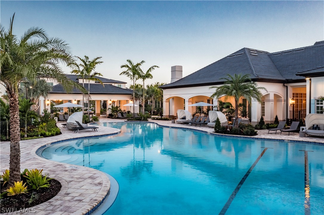 a view of a swimming pool with a patio