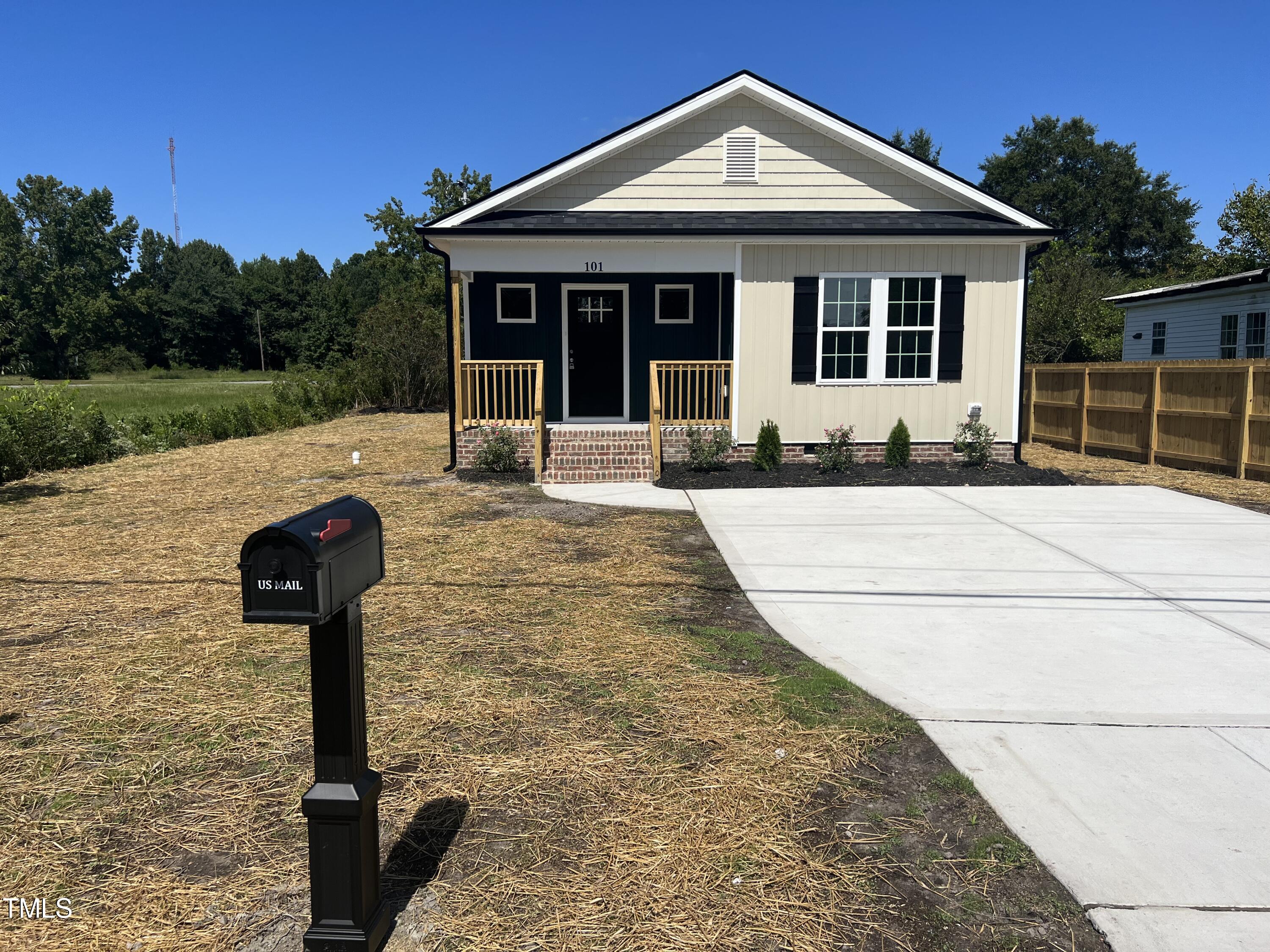 a front view of a house with yard