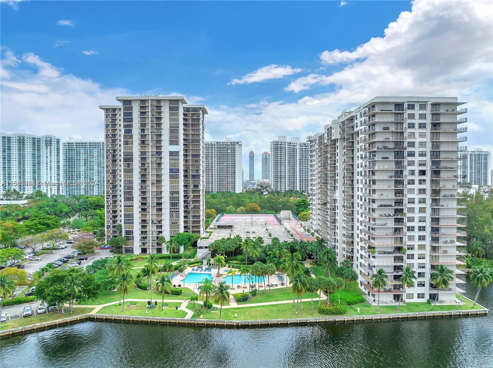 a view of a city with tall buildings in the background