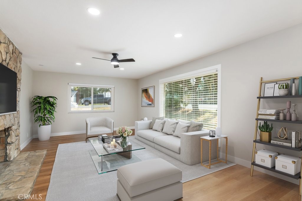 a living room with furniture and a window