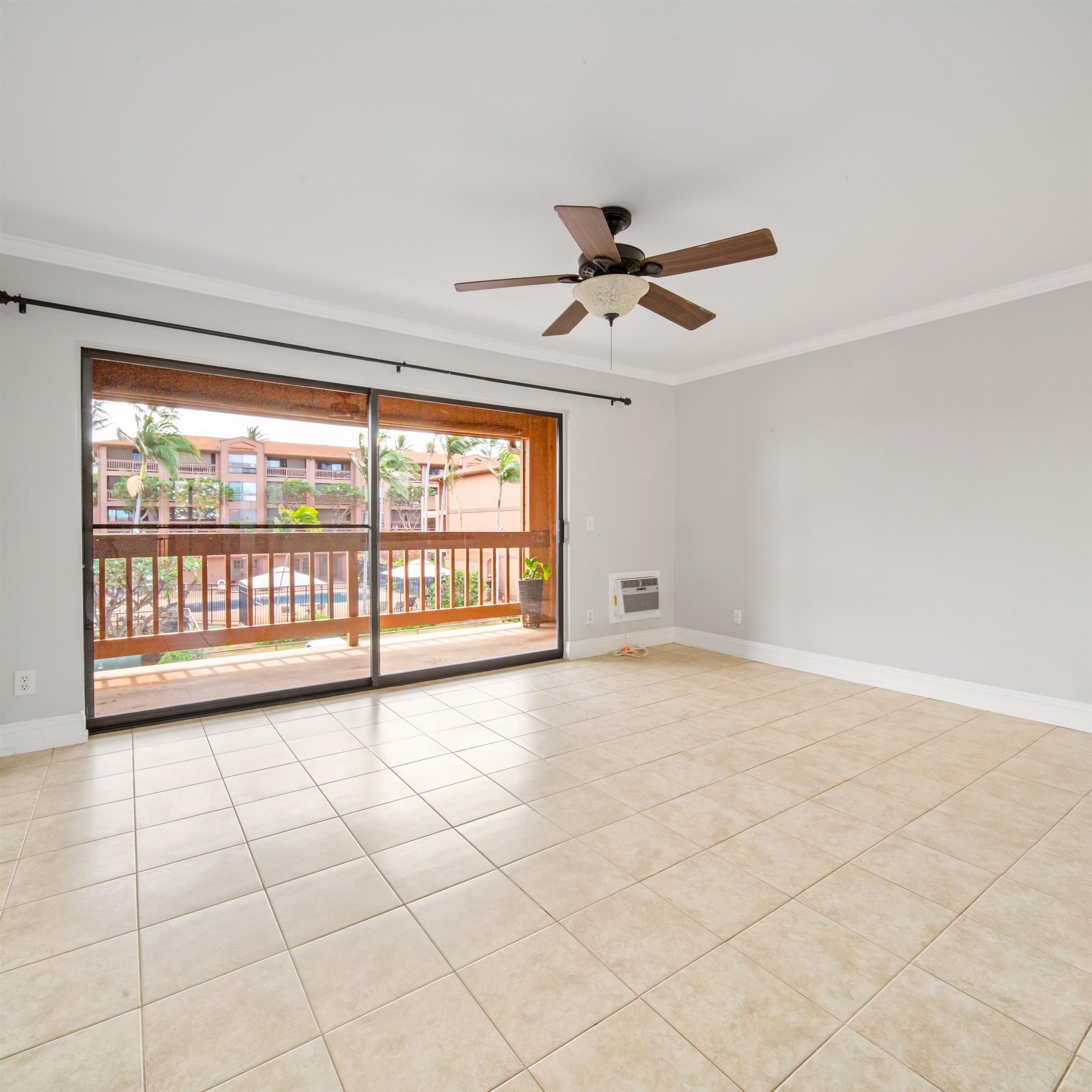 a view of an empty room with a window